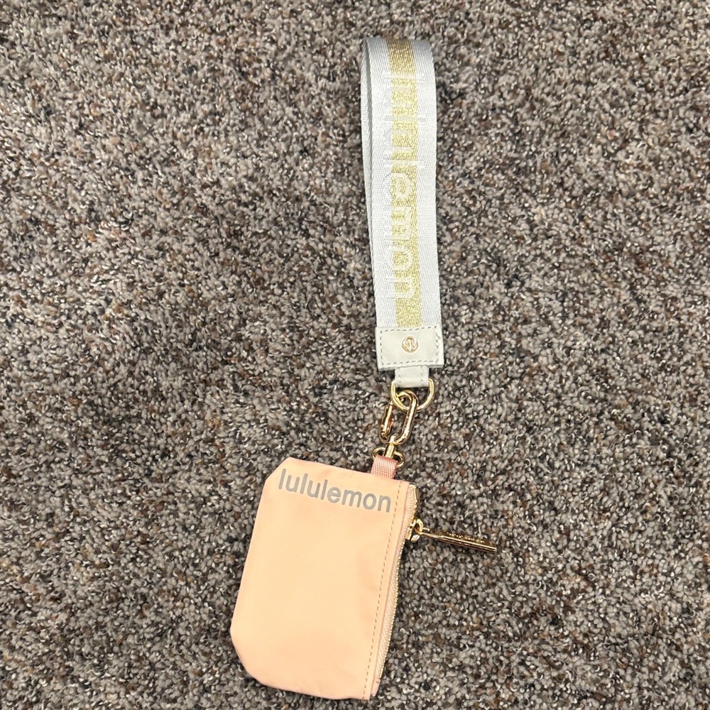 lululemon athletica peach card & key wristlet with gold hardware strap